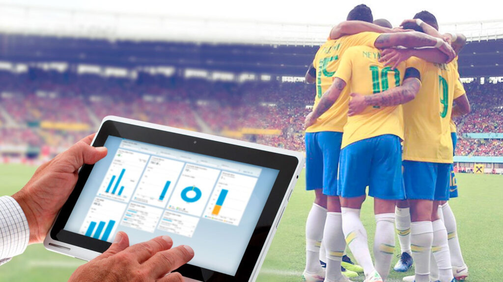 Gestor esportivo analisando relatórios digitais que integram gestão e performance de clube
